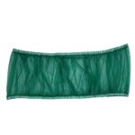 Green breathable nylon birdcage cover securely fitted around a birdcage, preventing seeds and debris from scattering