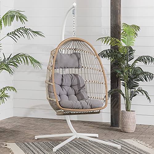 Walker Edison Carmel Modern Rattan Hanging Egg Swing Chair with Stand in Brown and Grey, perfect for outdoor relaxation